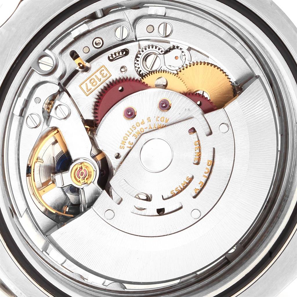 This image shows a close-up of the internal mechanical movement of a Rolex Explorer 216570 Men's Stainless Steel White Dial 216570 Men's Stainless Steel White Dial watch.