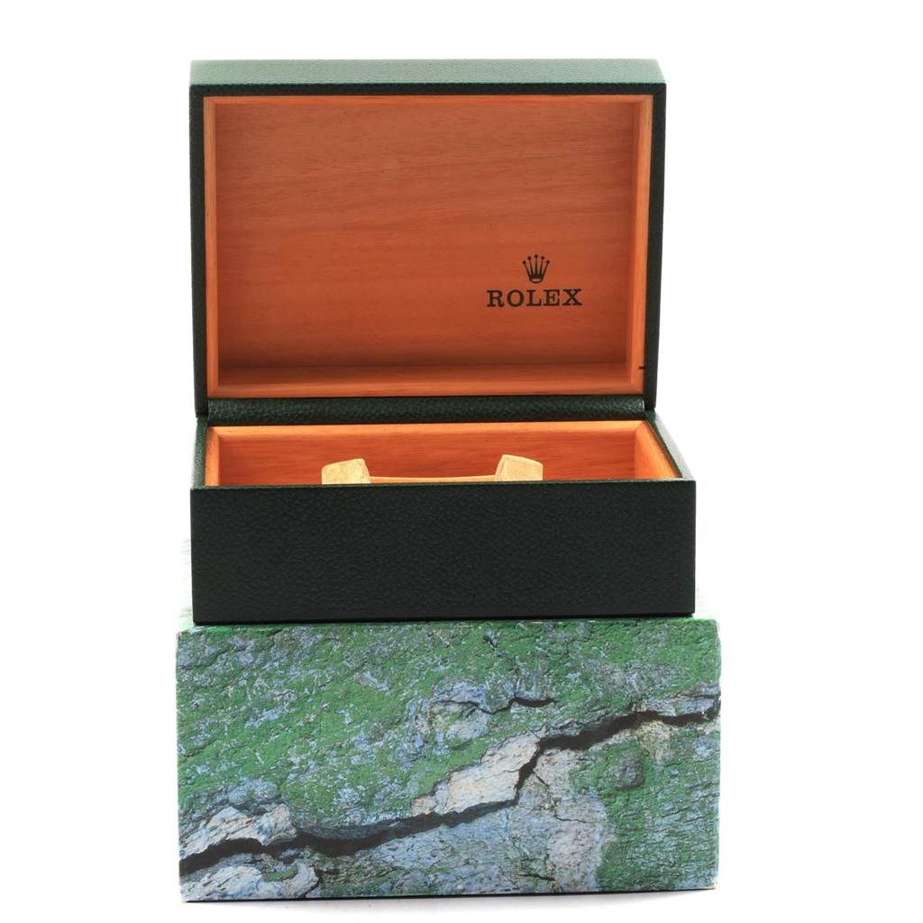 The image shows an open Rolex Explorer 16570 Men's Stainless Steel White Dial 16570 Men's Stainless Steel White Dial model watch box, revealing the interior compartments with the Rolex logo.