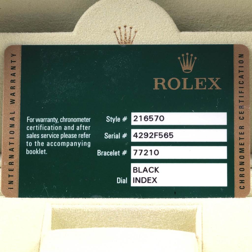 This is a close-up of the warranty card for a Rolex Explorer 216570 Men's Stainless Steel Black Dial 216570 Men's Stainless Steel Black Dial model, showing the style, serial, and bracelet numbers, and dial type.