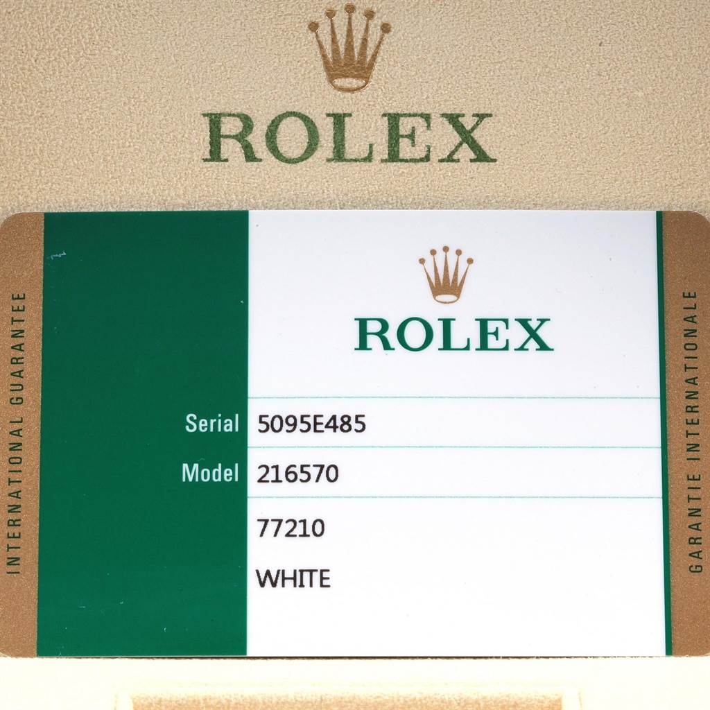 This image shows the warranty card for the Rolex Explorer 216570 Men's Stainless Steel White Dial 216570 Men's Stainless Steel White Dial model 216570 in white.