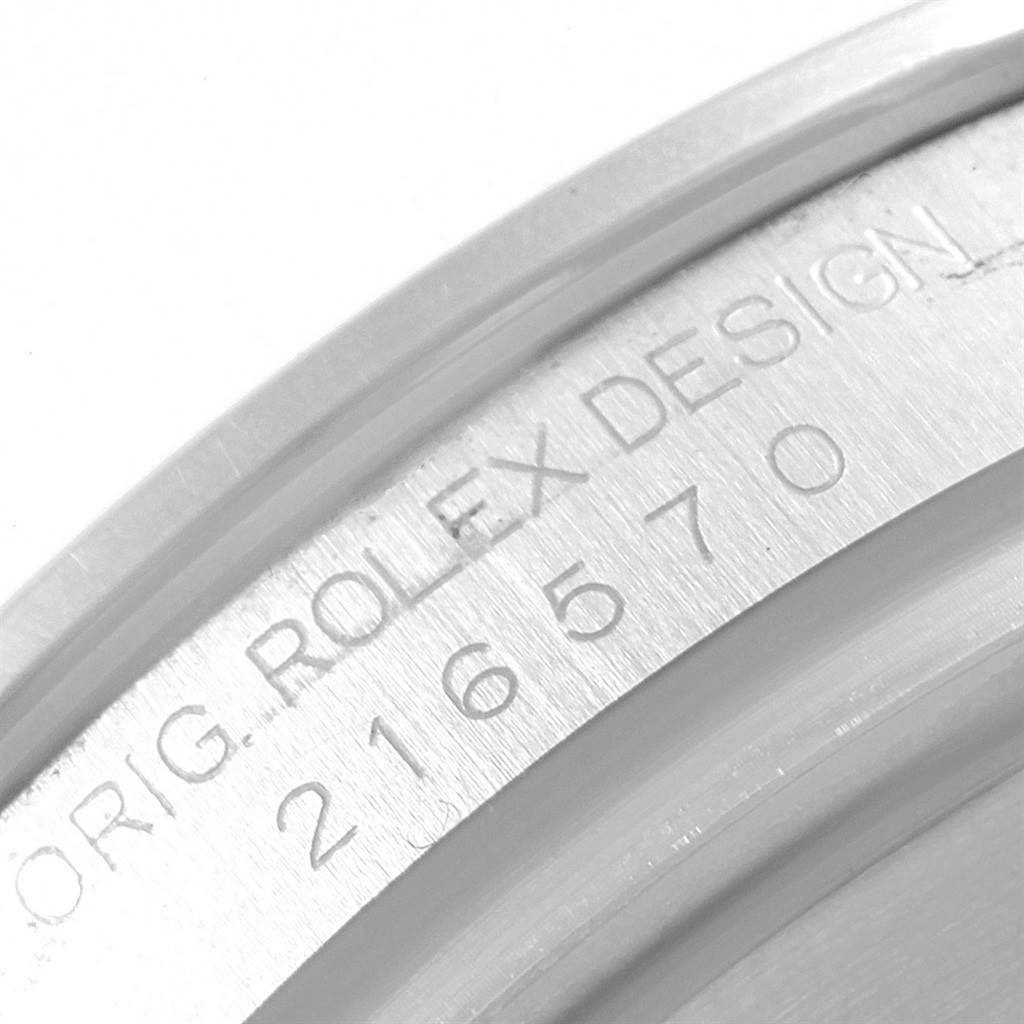 This image shows a close-up of the engraving on the case of a Rolex Explorer 216570 Men's Stainless Steel White Dial 216570 Men's Stainless Steel White Dial watch, highlighting the model number.