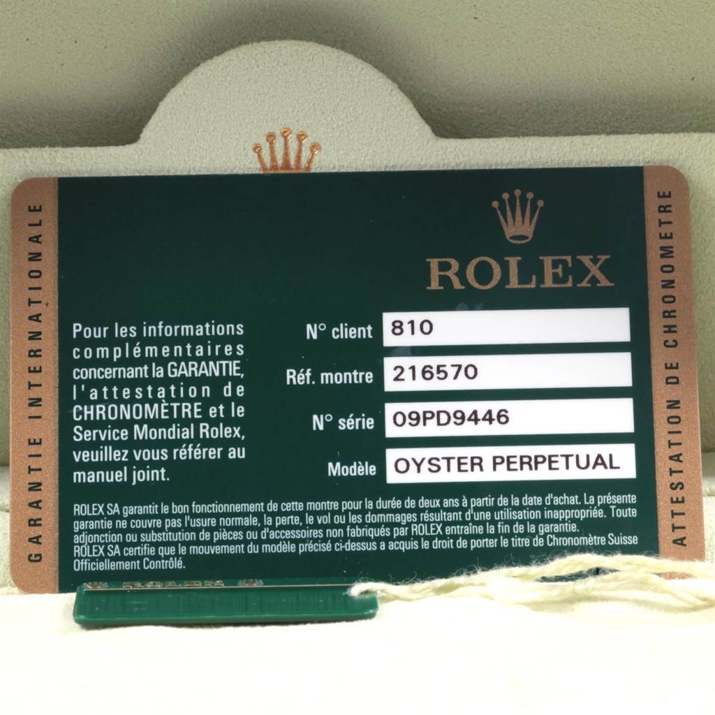 The image shows a warranty card for a Rolex Explorer 216570 Men's Stainless Steel White Dial 216570 Men's Stainless Steel White Dial watch, model Oyster Perpetual, ref: 216570.