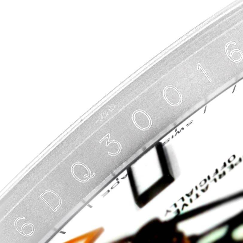 This close-up image shows the rehaut and part of the dial of a Rolex Explorer 216570 Men's Stainless Steel White Dial 216570 Men's Stainless Steel White Dial watch.