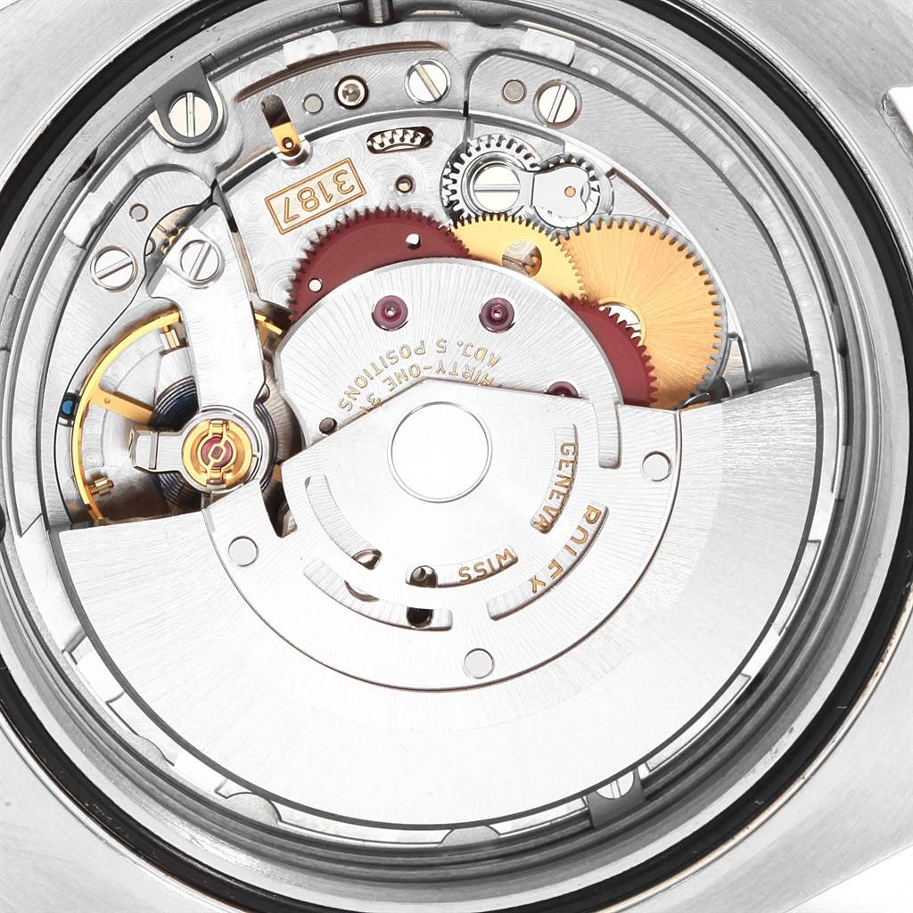 This close-up image shows the intricate internal mechanical parts of a Rolex Explorer 216570 Men's Stainless Steel White Dial 216570 Men's Stainless Steel White Dial watch from the back.