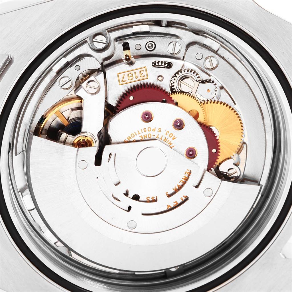 This is a close-up view of the movement mechanism inside a Rolex Explorer 216570 Men's Stainless Steel Black Dial 216570 Men's Stainless Steel Black Dial watch.