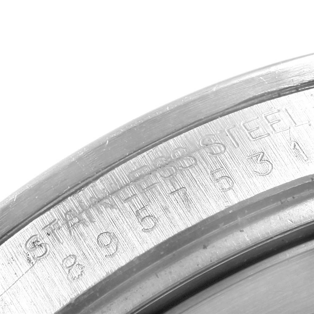 The image shows a close-up of the engraving on the stainless steel casing of a Rolex Explorer 16550 Men's Stainless Steel Beige Dial 16550 Men's Stainless Steel Beige Dial watch.