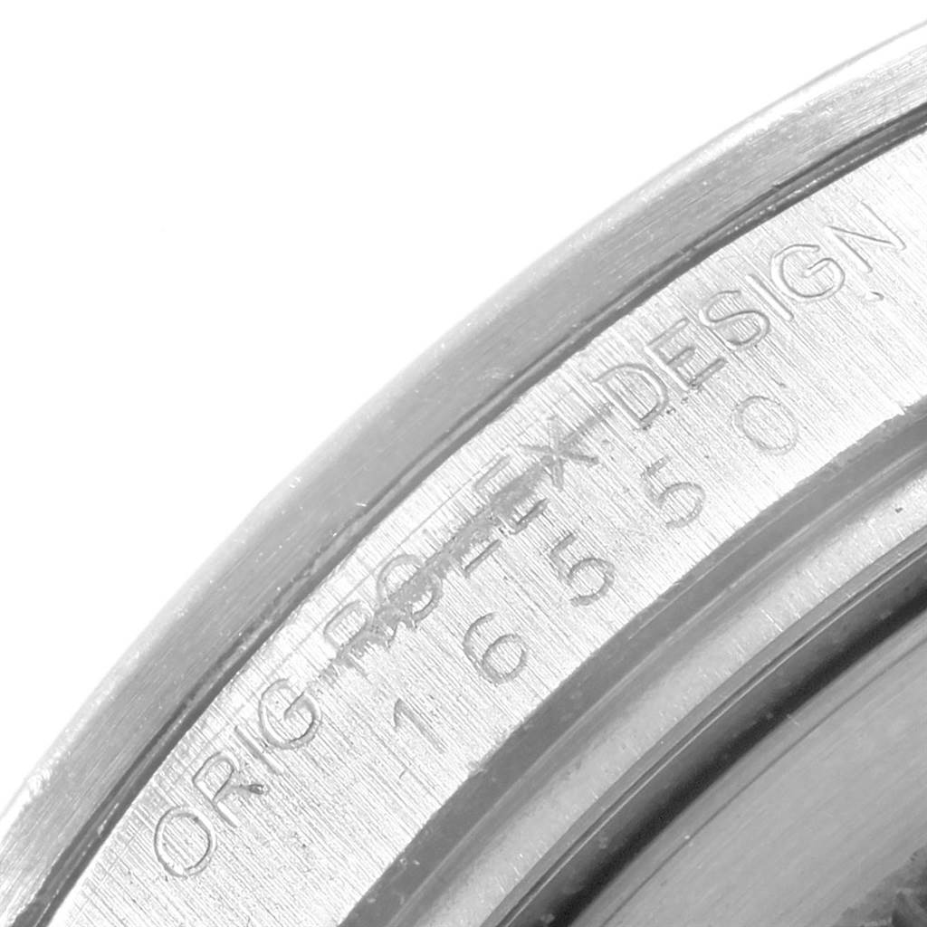 This close-up image shows the engraved inner bezel of a Rolex Explorer 16550 Men's Stainless Steel Beige Dial 16550 Men's Stainless Steel Beige Dial watch.