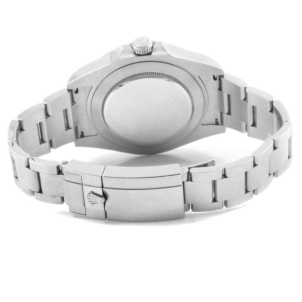 The image shows the back view of a Rolex Explorer 216570 Men's Stainless Steel White Dial 216570 Men's Stainless Steel White Dial watch featuring its case back and clasp on the bracelet.