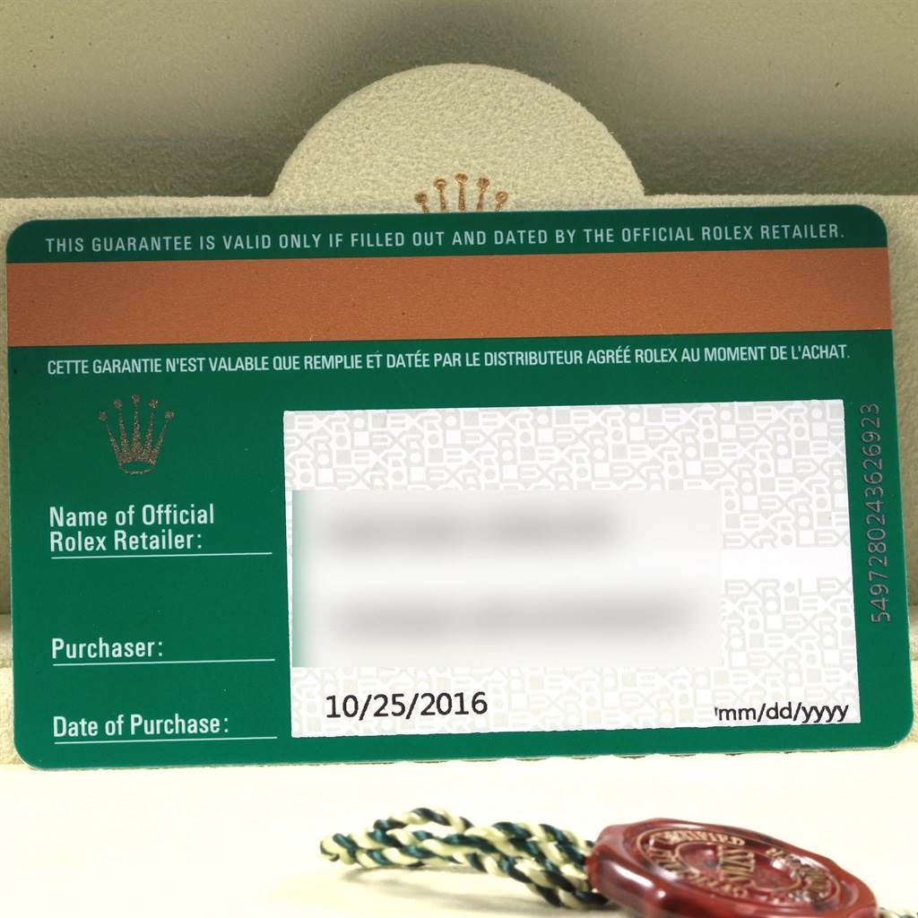 The image shows the guarantee card and tag for a Rolex Explorer 216570 Men's Stainless Steel White Dial 216570 Men's Stainless Steel White Dial watch.