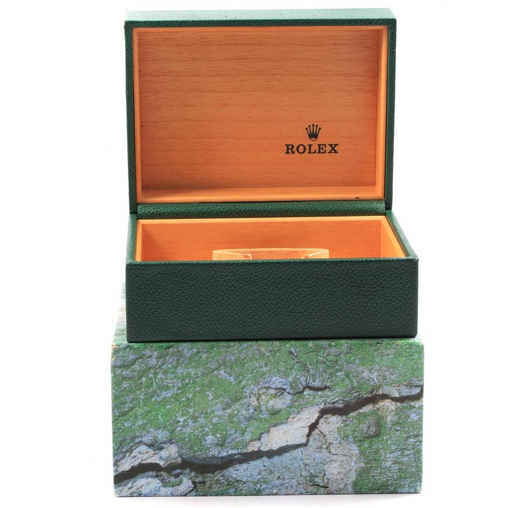 The image shows an opened Rolex Explorer 16570 Men's Stainless Steel Black Dial 16570 Men's Stainless Steel Black Dial watch box with the brand logo inside the lid.
