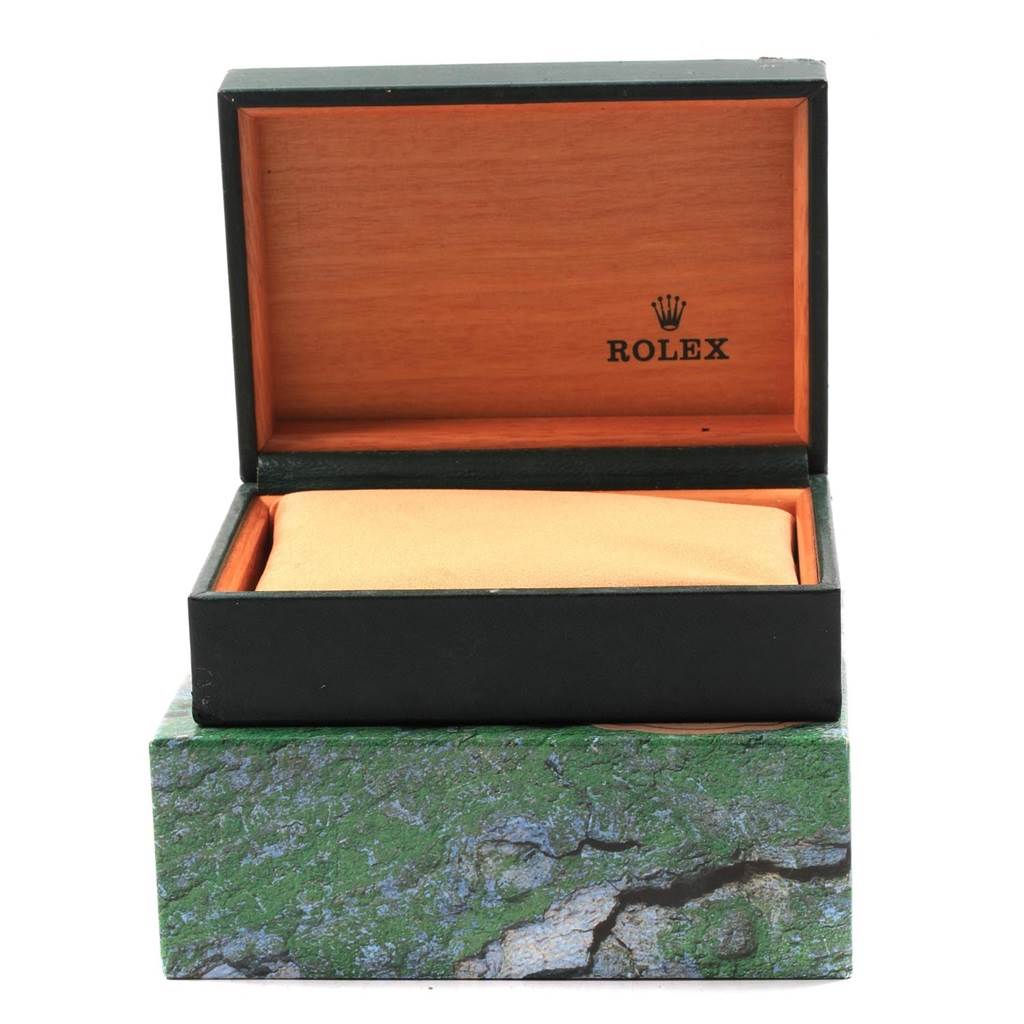 This image shows an open Rolex Explorer 16550 Men's Stainless Steel Black Dial 16550 Men's Stainless Steel Black Dial model watch box, featuring its cushioned interior.