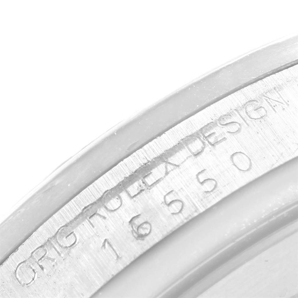This image shows a close-up of the serial number engraving on the side of a Rolex Explorer 16550 Men's Stainless Steel Black Dial 16550 Men's Stainless Steel Black Dial watch case.