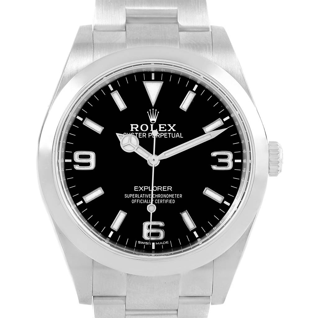 The Rolex Explorer 214270 Men
s Stainless Steel Black Dial 214270 Men
s Stainless Steel Black Dial watch is shown from the front, displaying its dial, bezel, hands, hour markers, crown, and bracelet.