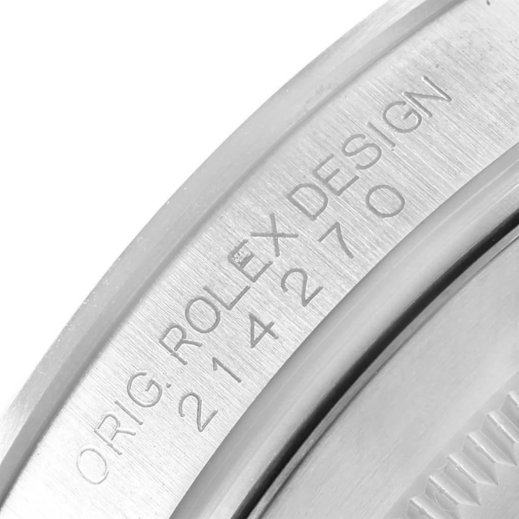 This close-up image shows the engraved design details on the back case of a Rolex Explorer 214270 Men
s Stainless Steel Black Dial 214270 Men
s Stainless Steel Black Dial watch.