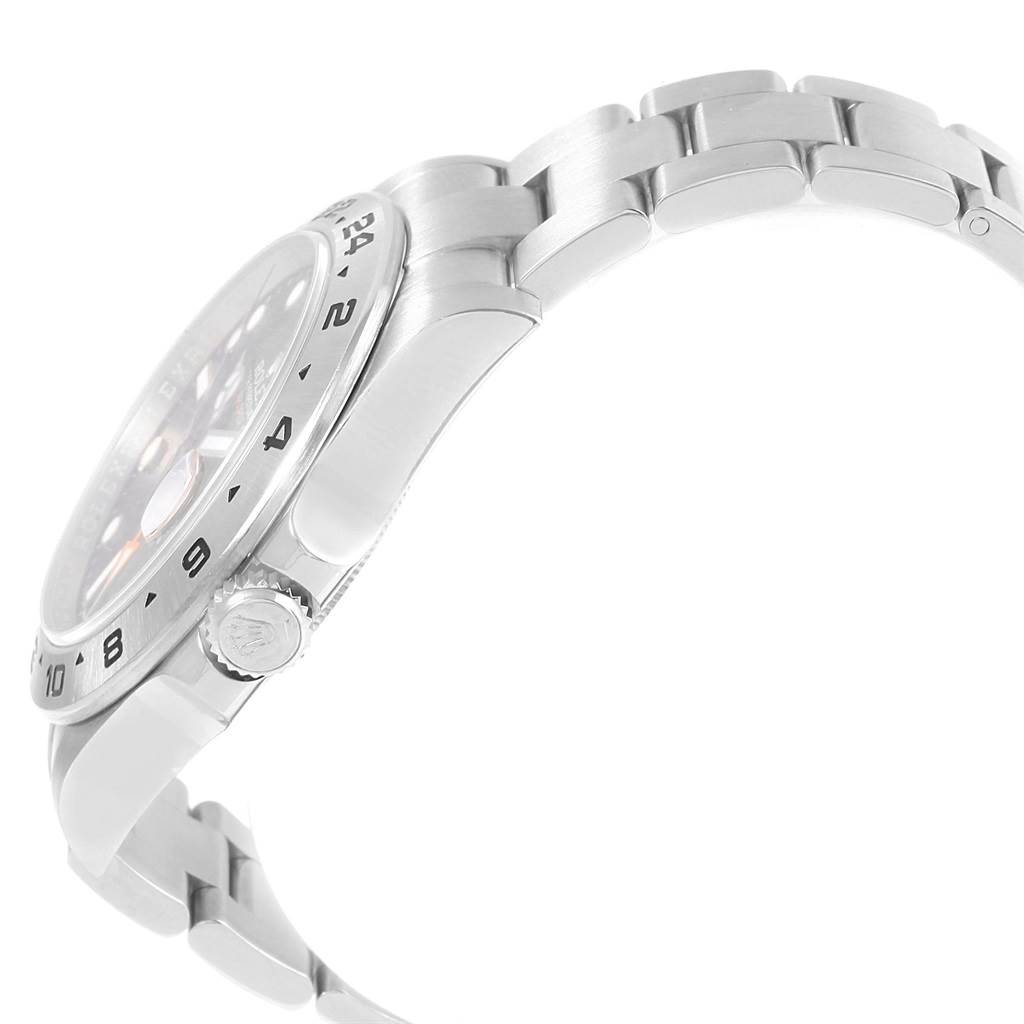 The image shows a side view of the Rolex Explorer 216570 Men's Stainless Steel Black Dial 216570 Men's Stainless Steel Black Dial watch focusing on the crown, case, and part of the bracelet.