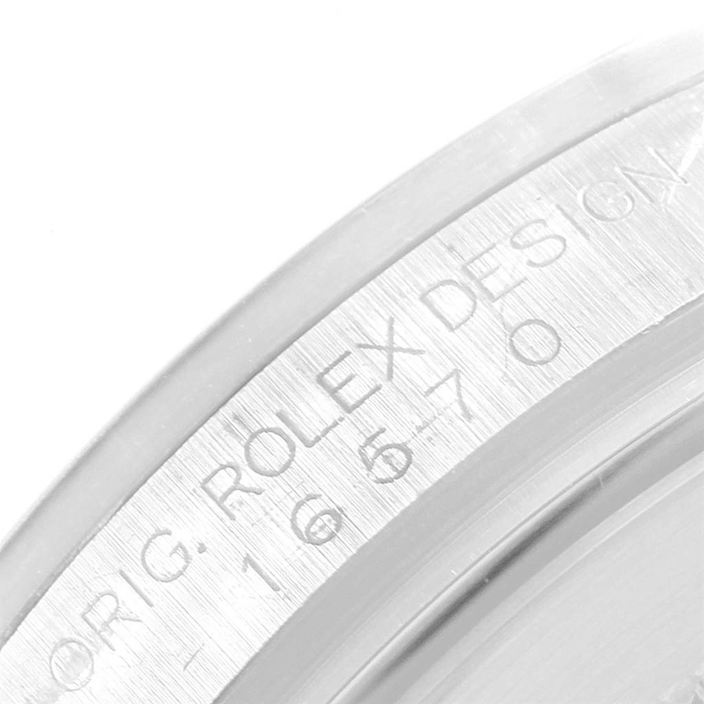 The image shows a close-up of the case back edge with engraving on a Rolex Explorer 16570 Men's Stainless Steel White Dial 16570 Men's Stainless Steel White Dial watch.