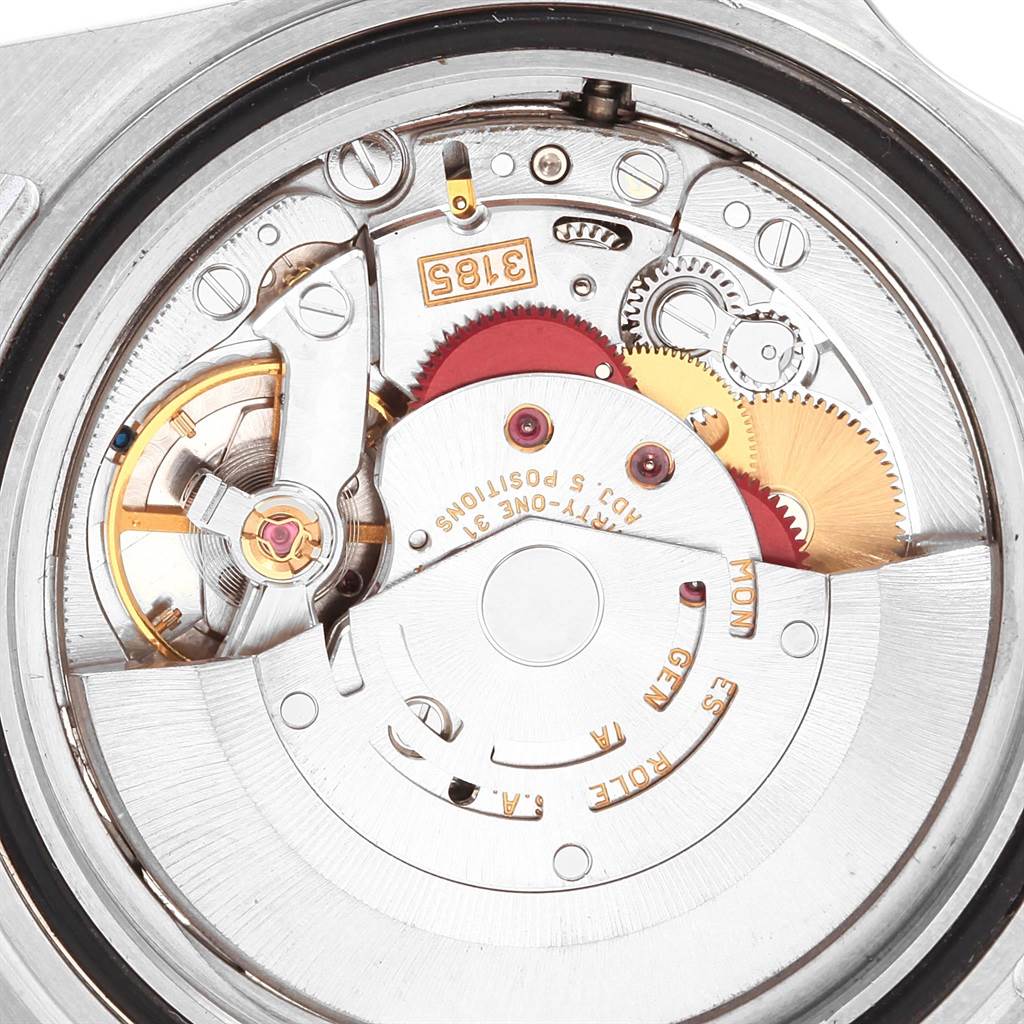 This image shows the movement mechanism of a Rolex Explorer 16570 Men's Stainless Steel White Dial 16570 Men's Stainless Steel White Dial watch, focusing on gears, wheels, and intricate components.