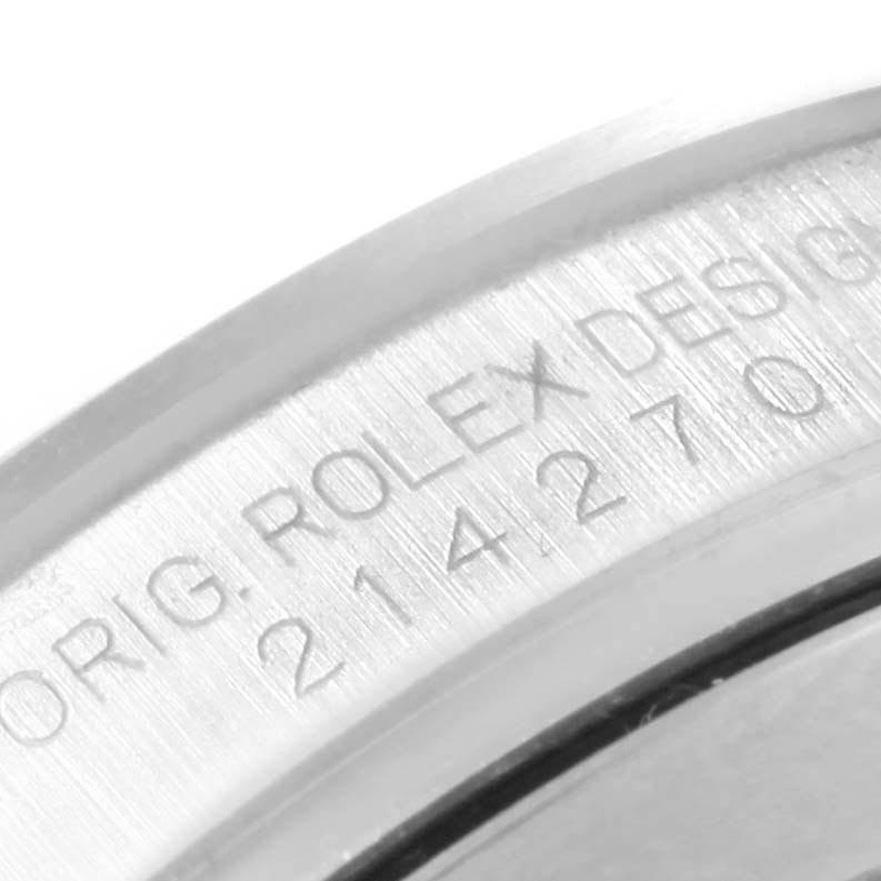 The image shows a close-up of the case back edge featuring the engraving on a Rolex Explorer 214270 Men's Stainless Steel Black Dial 214270 Men's Stainless Steel Black Dial model watch.