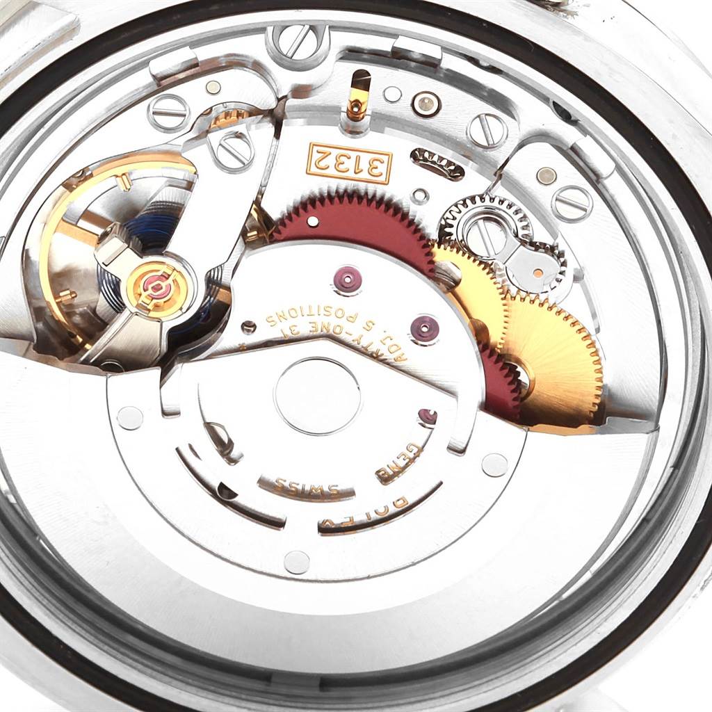 This image shows the movement and internal components of a Rolex Explorer 214270 Men's Stainless Steel Black Dial 214270 Men's Stainless Steel Black Dial model watch.