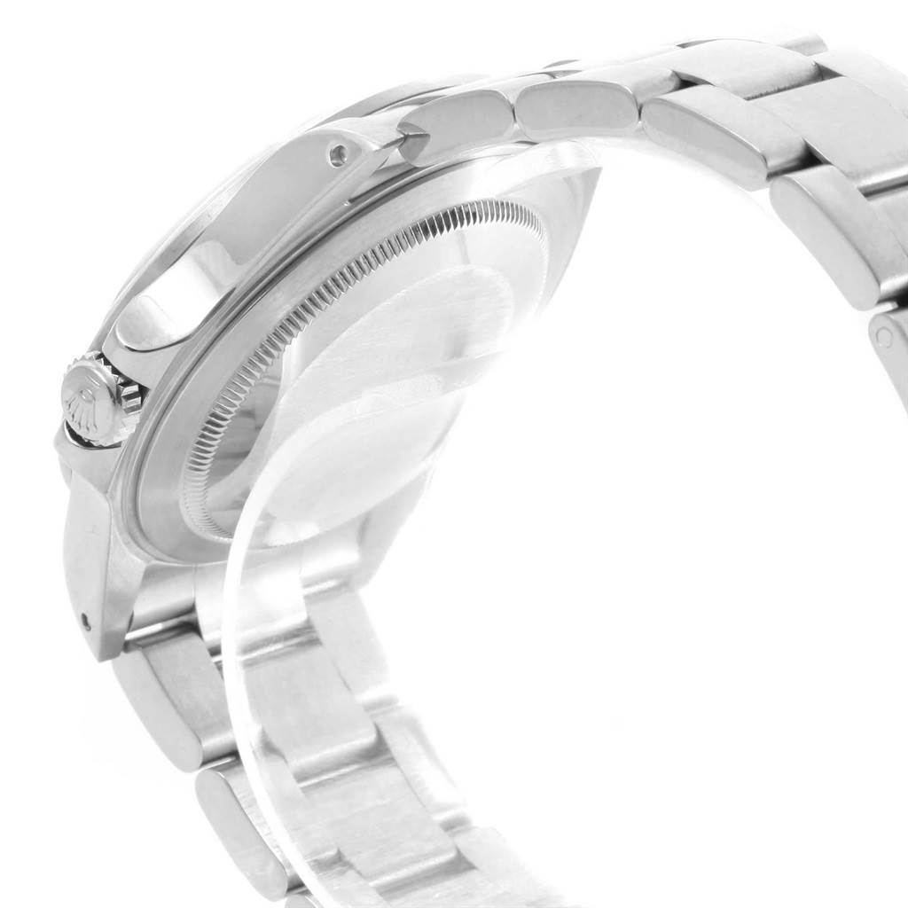 The image shows a side and rear view of the Rolex Explorer 16570 Men's Stainless Steel White Dial 16570 Men's Stainless Steel White Dial, highlighting the crown, case back, and part of the bracelet.