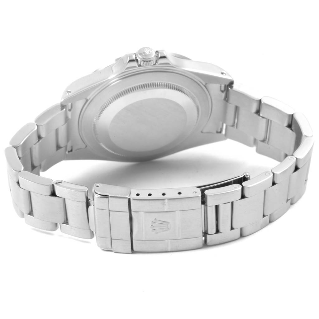 The image shows the Rolex Explorer 16570 Men's Stainless Steel White Dial 16570 Men's Stainless Steel White Dial model watch from the back, highlighting the case back and clasp.