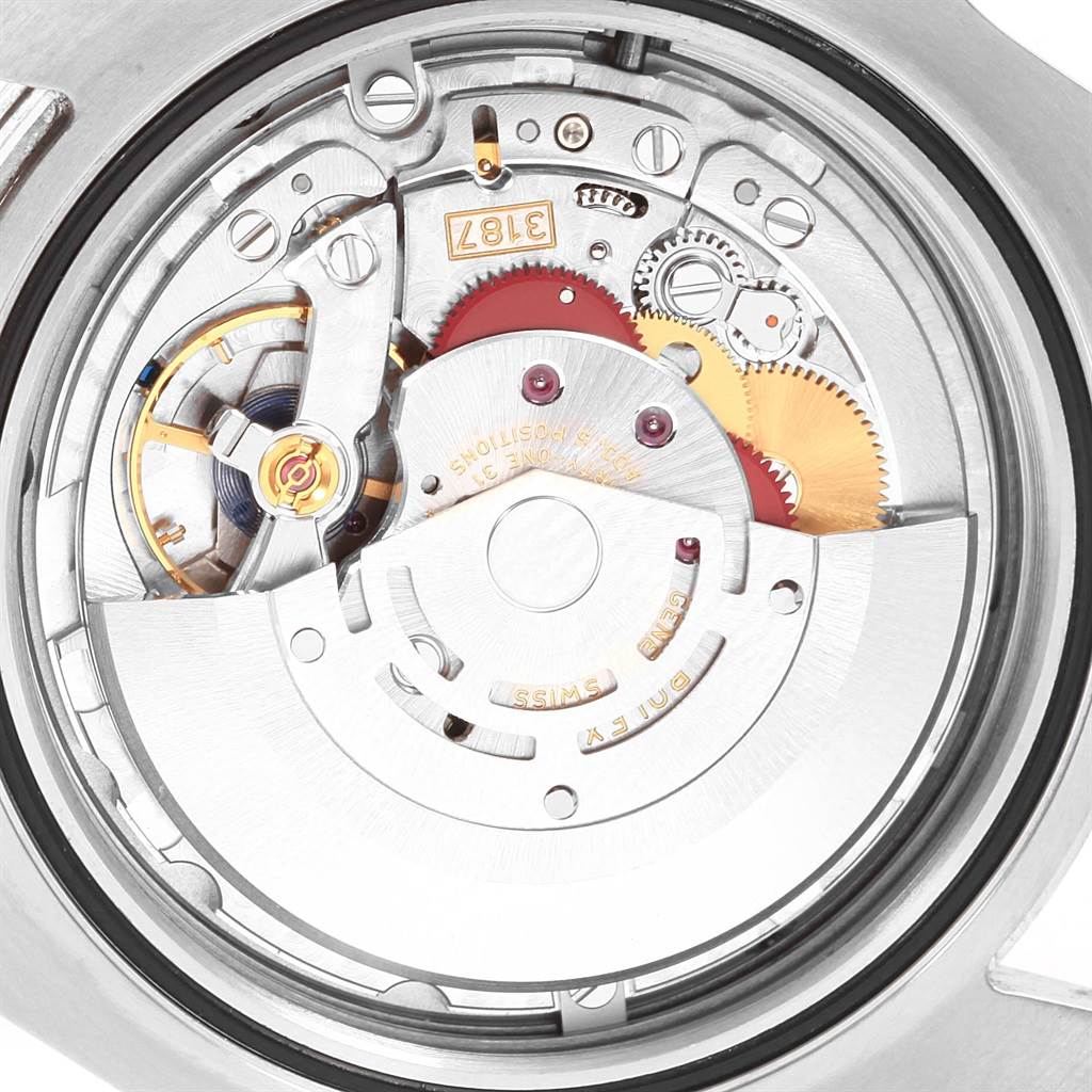 The image shows a close-up view of the movement inside a Rolex Explorer 216570 Men's Stainless Steel White Dial 216570 Men's Stainless Steel White Dial watch, focusing on the intricate gears and components.