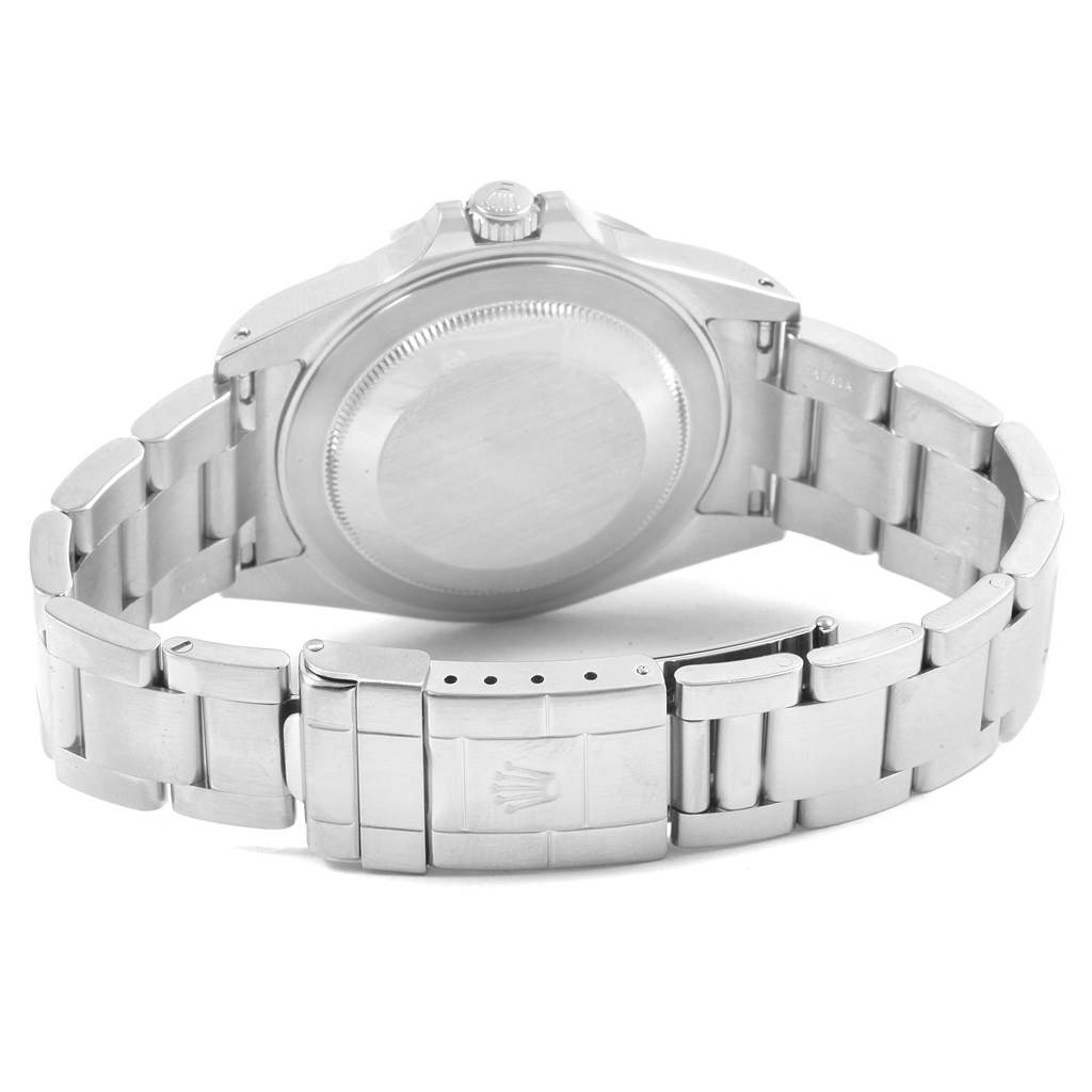 The image shows the back view of the Rolex Explorer 16570 Men
s Stainless Steel Black Dial 16570 Men
s Stainless Steel Black Dial watch, including the case back, crown, and clasp of the bracelet.