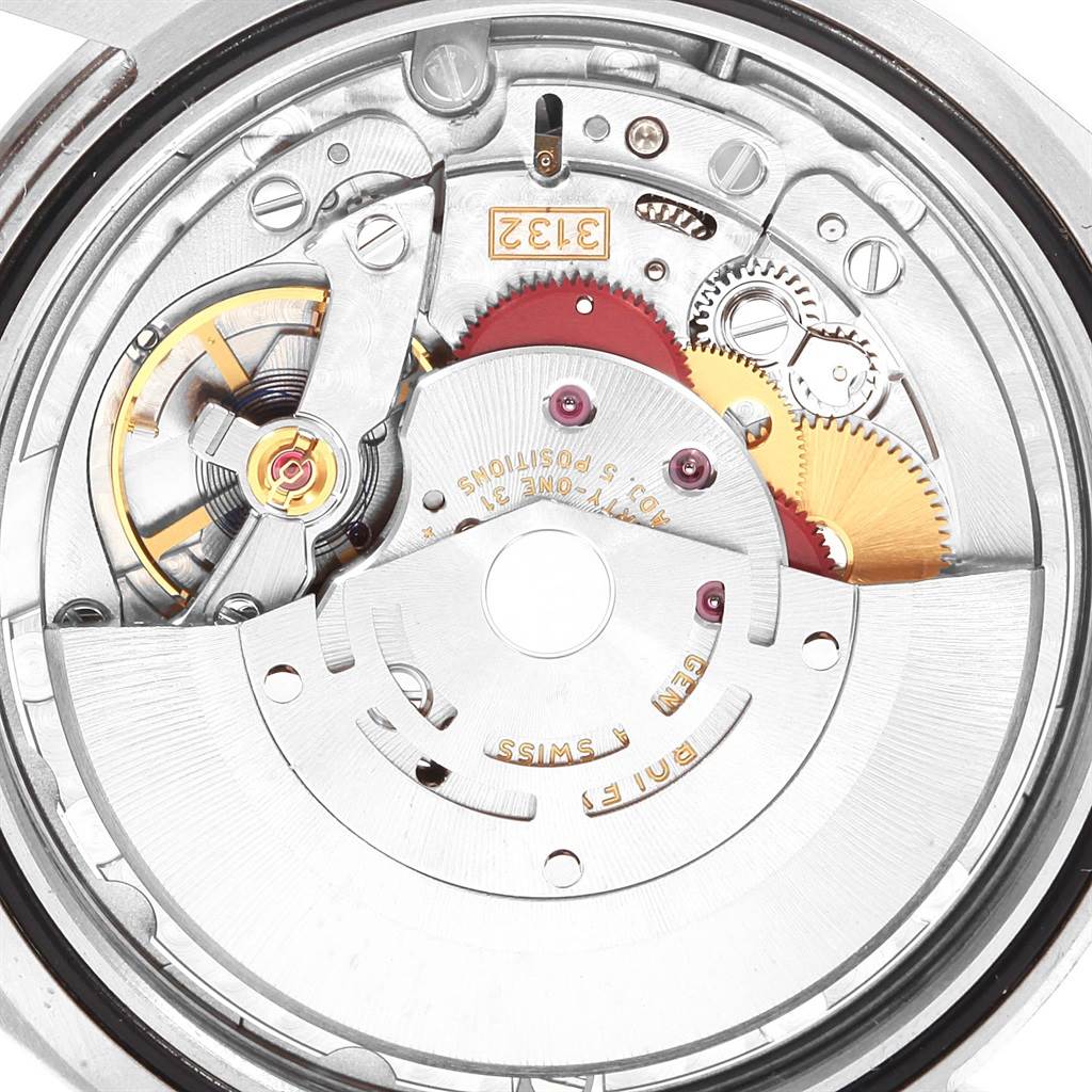 This image shows the internal mechanism of a Rolex Explorer 214270 Men's Stainless Steel Black Dial 214270 Men's Stainless Steel Black Dial watch, focusing on its intricate gears and components.
