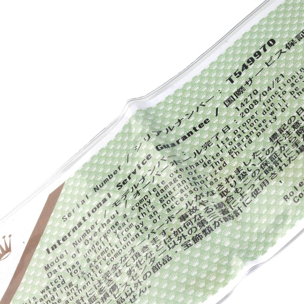 This image shows a close-up of the International Service Guarantee card for the Rolex Explorer 14270 Men
s Stainless Steel Black Dial 14270 Men
s Stainless Steel Black Dial, displaying the serial number.