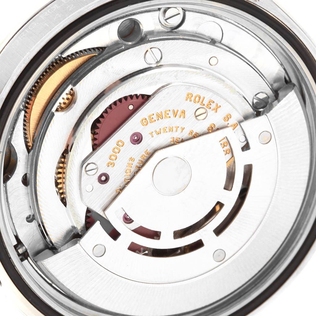 This image shows a close-up view of the movement mechanism inside a Rolex Explorer 14270 Men
s Stainless Steel Black Dial 14270 Men
s Stainless Steel Black Dial watch.