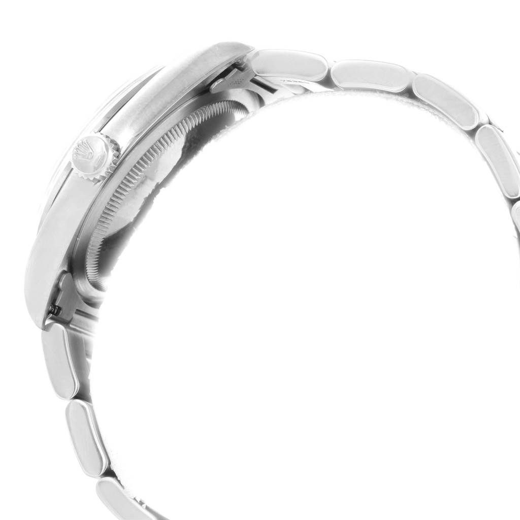 The side view of the Rolex Explorer 14270 Men
s Stainless Steel Black Dial 14270 Men
s Stainless Steel Black Dial watch shows the crown and part of the bracelet.