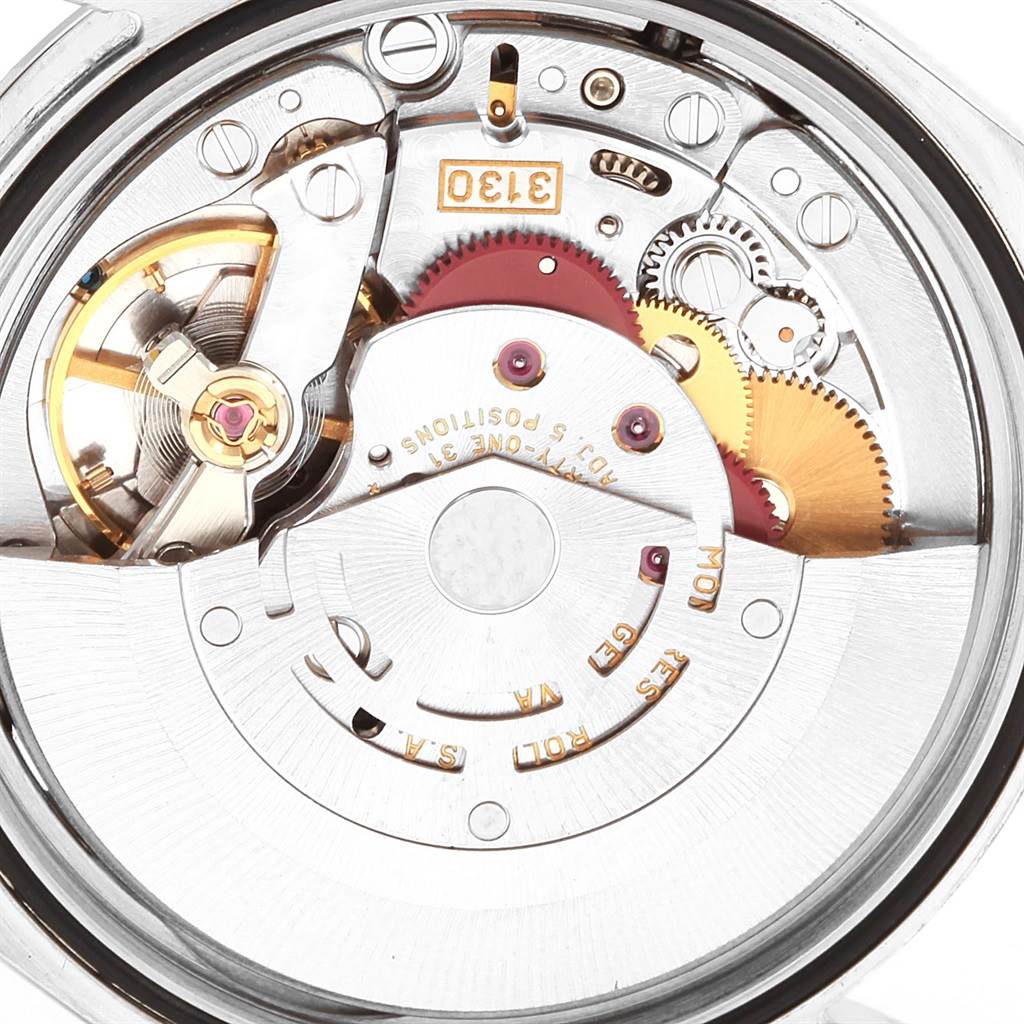 This close-up shot shows the internal mechanical movement of a Rolex Explorer 114270 Men's Stainless Steel Black Dial 114270 Men's Stainless Steel Black Dial model watch.