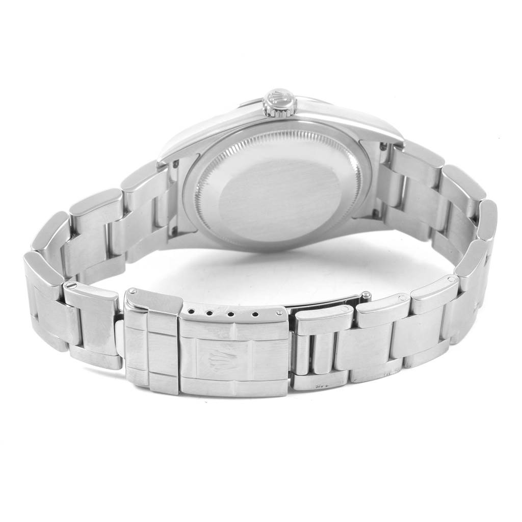 This image shows the back of a Rolex Explorer 114270 Men's Stainless Steel Black Dial 114270 Men's Stainless Steel Black Dial watch, highlighting the case back, crown, and bracelet with clasp.