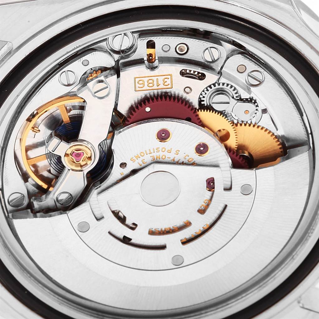 This image shows the intricate internal mechanism and parts of a Rolex Explorer 16570 Men's Stainless Steel White Dial 16570 Men's Stainless Steel White Dial watch viewed from the back.