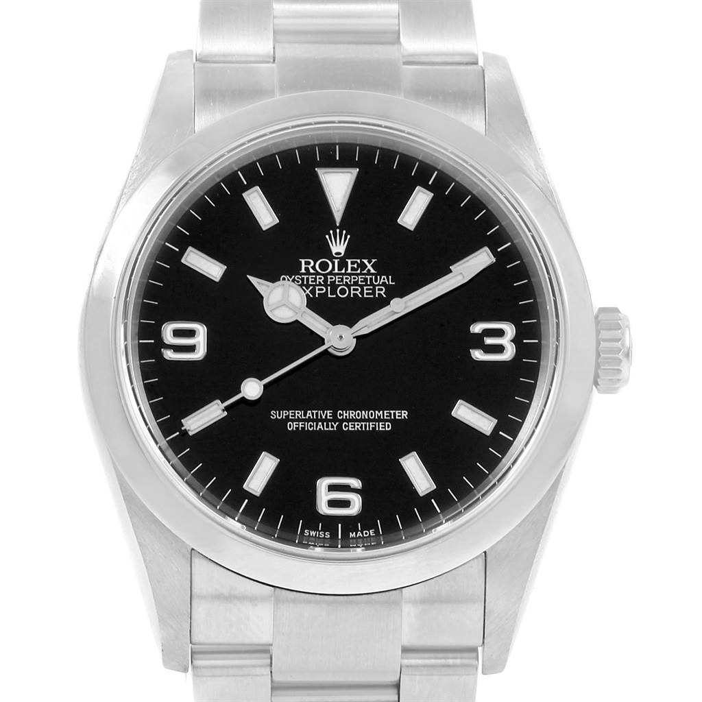 This image shows a front view of a Rolex Explorer 114270 Men's Stainless Steel Black Dial 114270 Men's Stainless Steel Black Dial watch, highlighting its black dial, hour markers, hands, and partial bracelet.