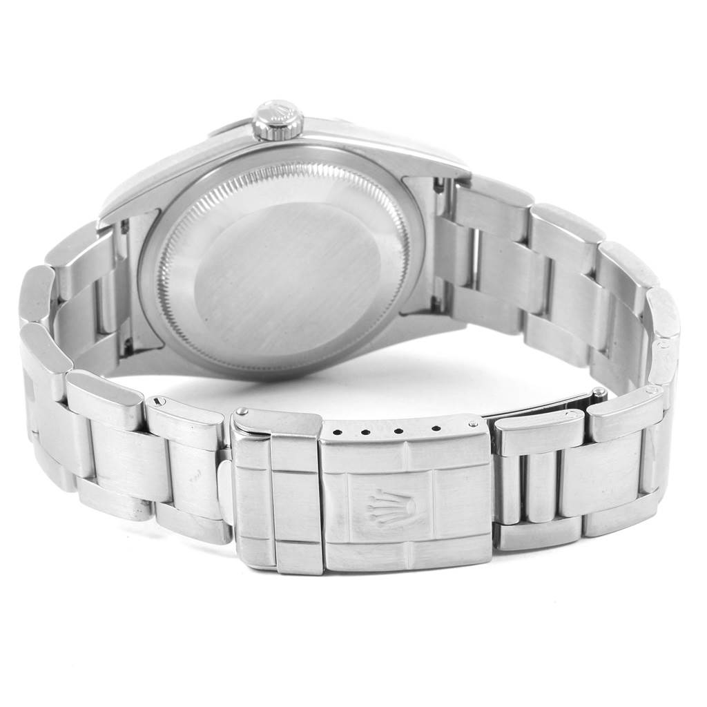 The image shows the back and bracelet of a Rolex Explorer 114270 Men's Stainless Steel Black Dial 114270 Men's Stainless Steel Black Dial model, focusing on the case back and clasp.