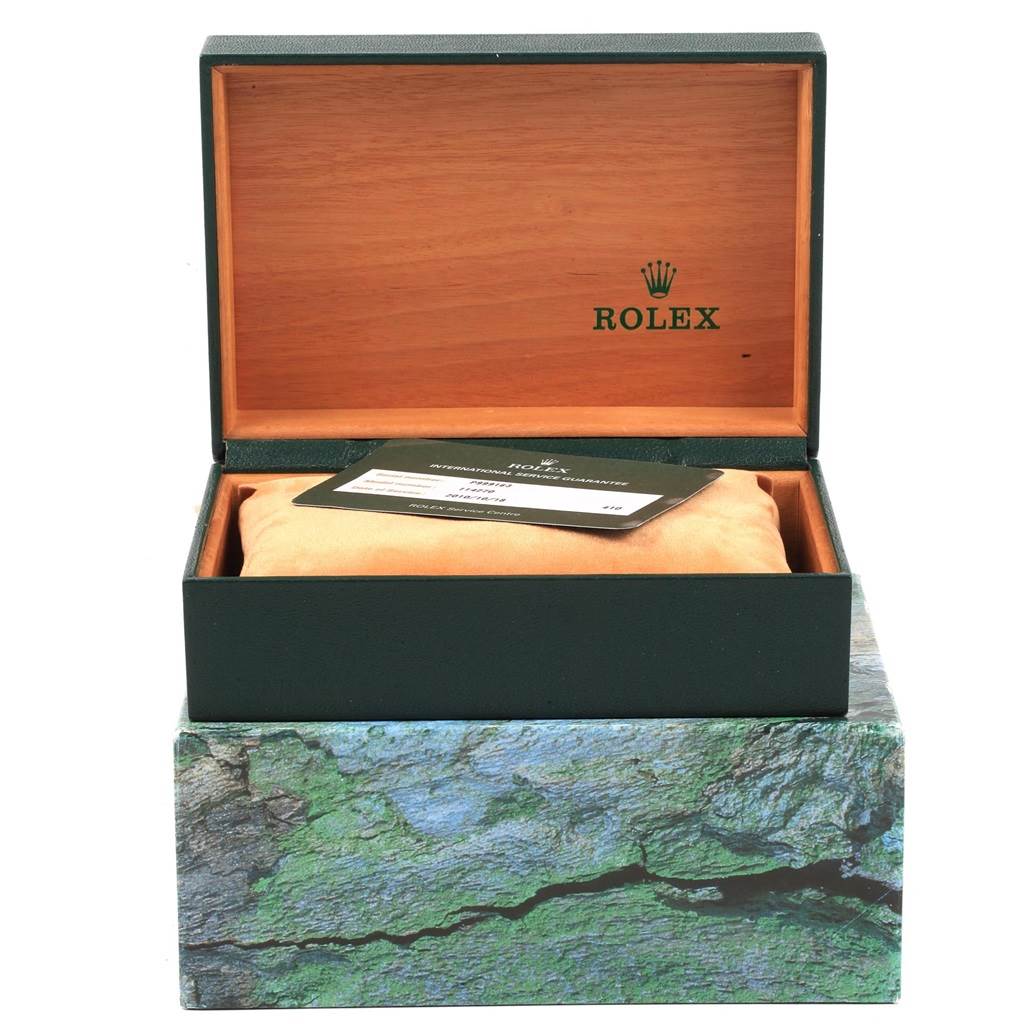 The image shows an open Rolex Explorer 114270 Men's Stainless Steel Black Dial 114270 Men's Stainless Steel Black Dial watch box with interior cushion and an authentication card.