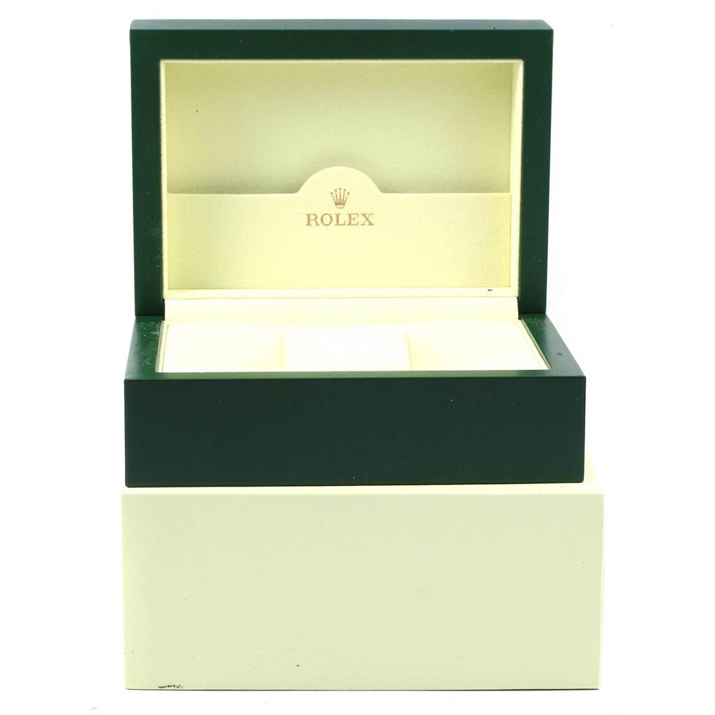 This image shows an open box for a Rolex Explorer 16570 Men's Stainless Steel Black Dial 16570 Men's Stainless Steel Black Dial model watch, showcasing the interior compartments.