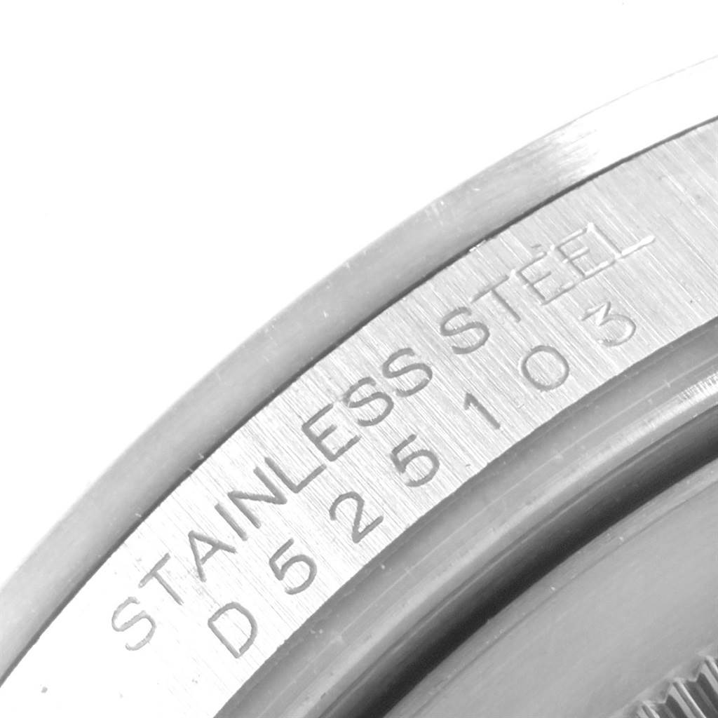 This image shows a close-up of the serial number engraving on the stainless steel case of a Rolex Explorer 16570 Men
s Stainless Steel Black Dial 16570 Men
s Stainless Steel Black Dial watch.