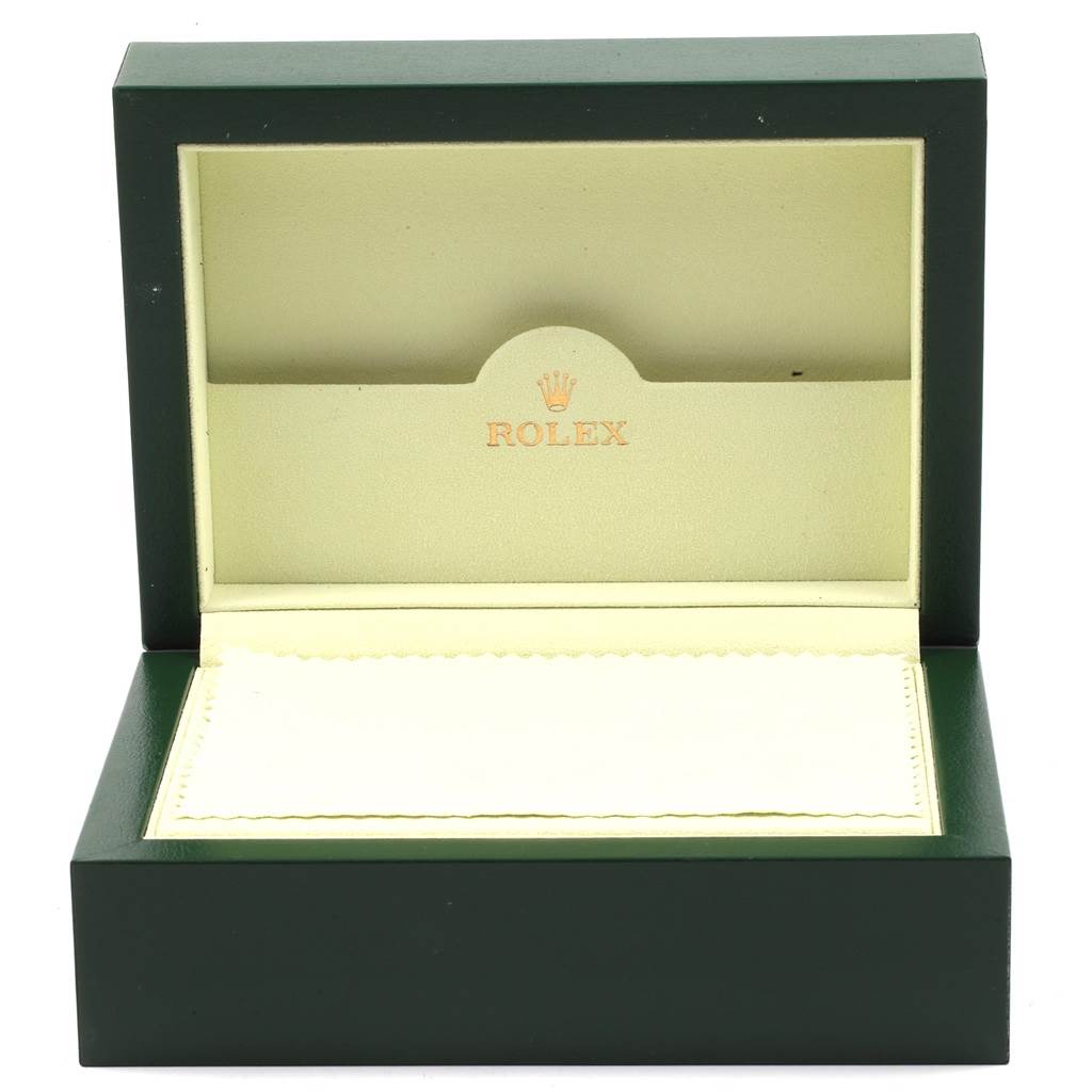 This image shows the open green and cream-colored box for the Rolex Explorer 16570 Men
s Stainless Steel Black Dial 16570 Men
s Stainless Steel Black Dial model wristwatch.