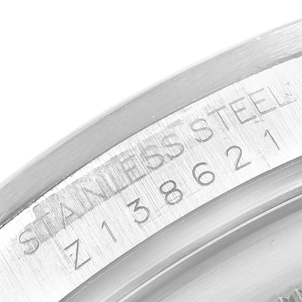 This close-up image shows the stainless steel case back of a Rolex Explorer 16570 Men
s Stainless Steel White Dial 16570 Men
s Stainless Steel White Dial watch, highlighting the model number engraving.