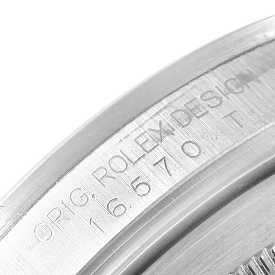 The image shows the engraved side of the bezel of a Rolex Explorer 16570 Men's Stainless Steel White Dial 16570 Men's Stainless Steel White Dial watch.