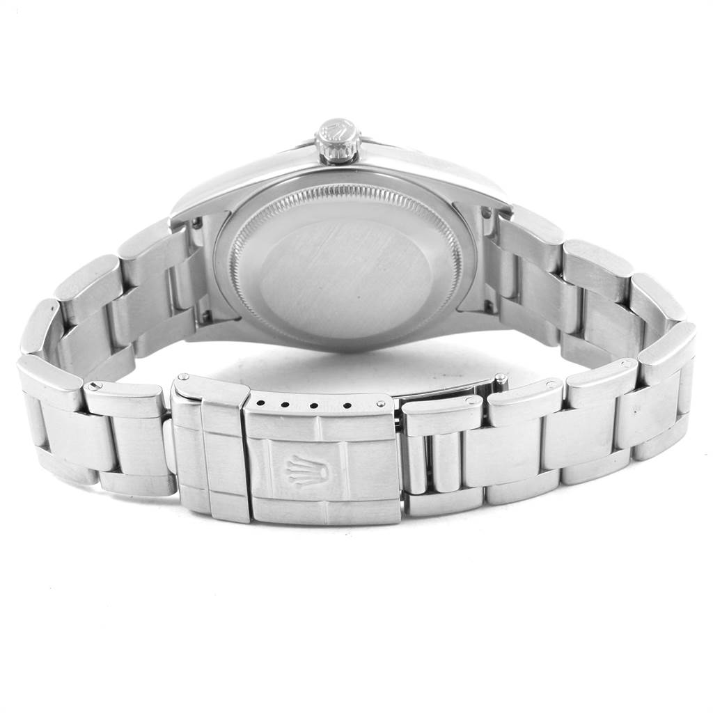 The image shows the back view of a Rolex Explorer 114270 Men's Stainless Steel Black Dial 114270 Men's Stainless Steel Black Dial watch, highlighting its closed clasp and bracelet.