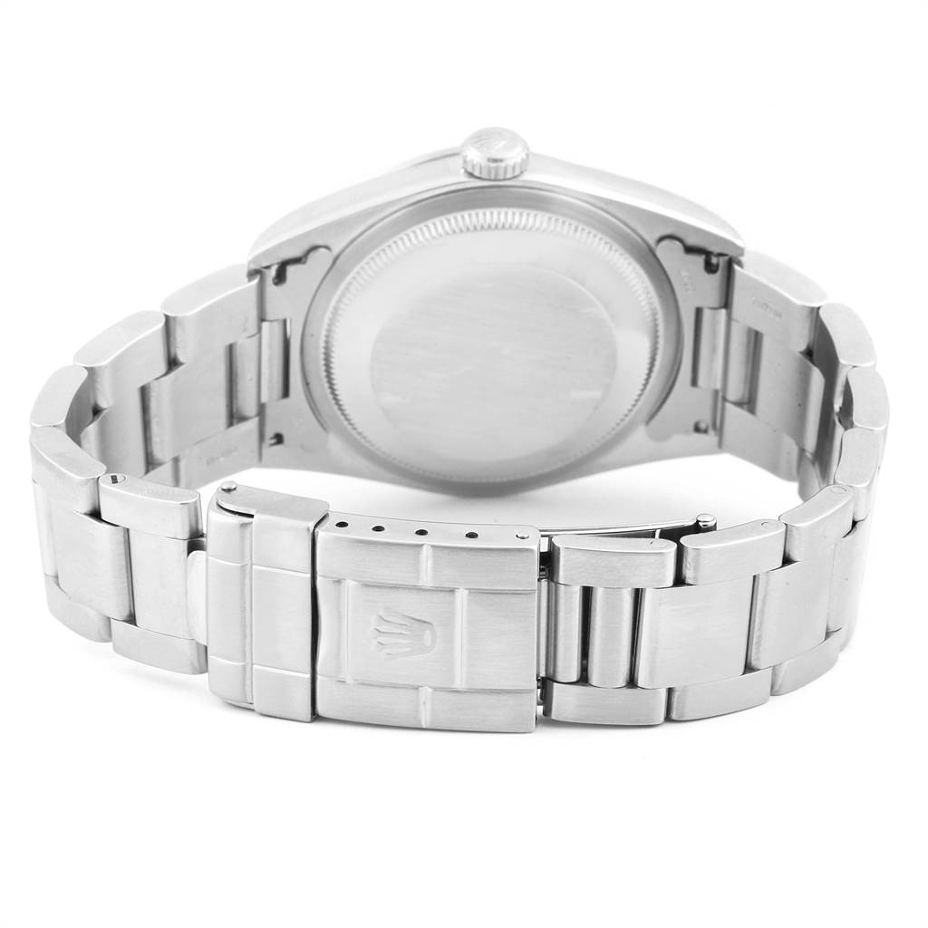 This image shows the backside and bracelet clasp of a Rolex Explorer 14270 Men's Stainless Steel Black Dial 14270 Men's Stainless Steel Black Dial watch, highlighting its stainless steel case and bracelet.