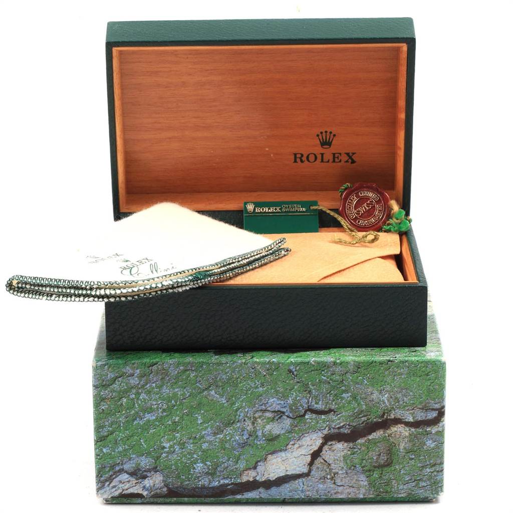 The image shows the open box and accessories of a Rolex Explorer 14270 Men's Stainless Steel Black Dial 14270 Men's Stainless Steel Black Dial watch, including tags, cloth, and a certificate.