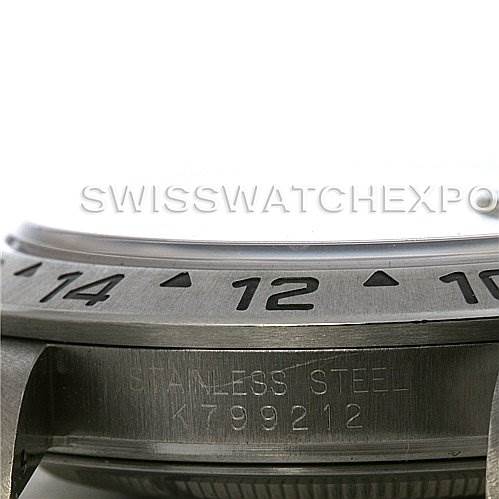 This image shows a close-up side view of the bezel and part of the case of a Rolex Explorer 16570 Men's Stainless Steel Black Dial 16570 Men's Stainless Steel Black Dial watch, highlighting the engraved numbers and serial number.