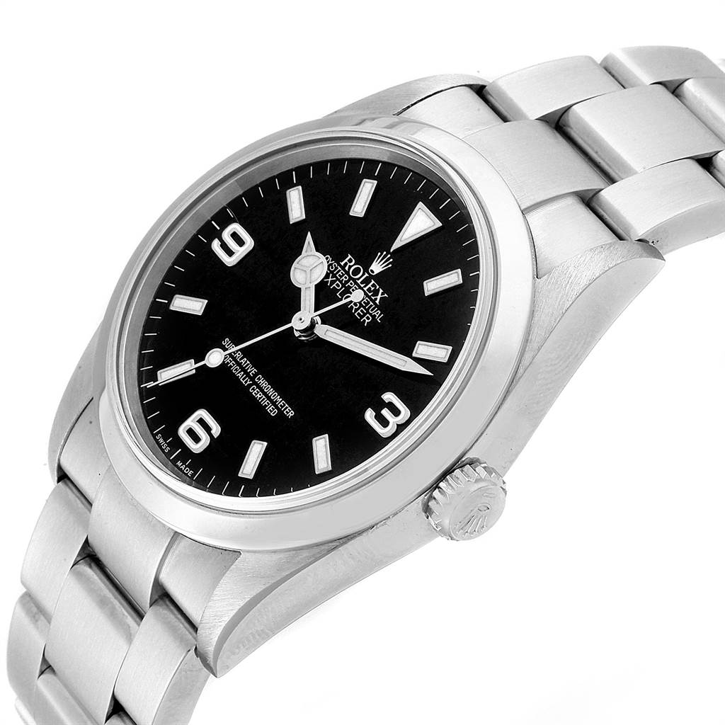 The Rolex Explorer 114270 Men's Stainless Steel Black Dial 114270 Men's Stainless Steel Black Dial watch is shown at a slight angle, displaying the face, crown, black dial, and part of the stainless steel bracelet.