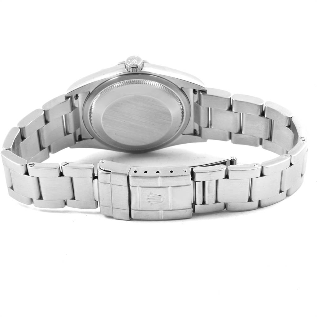 The image shows the back view of the Rolex Explorer 114270 Men's Stainless Steel Black Dial 114270 Men's Stainless Steel Black Dial watch, displaying the case back and metal bracelet.