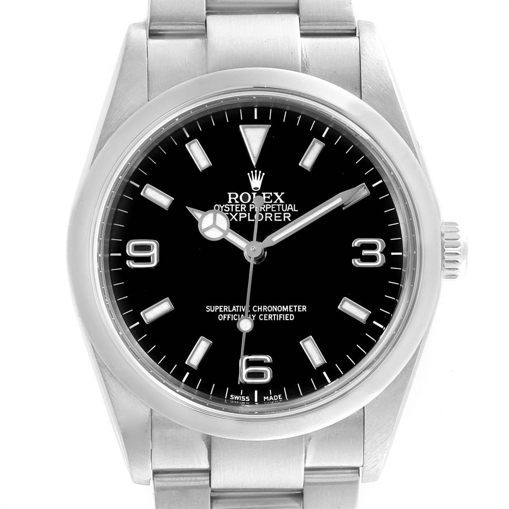 The Rolex Explorer 114270 Men's Stainless Steel Black Dial 114270 Men's Stainless Steel Black Dial watch is shown from a top-down angle, displaying its black dial, hour markers, hands, and stainless steel bracelet.