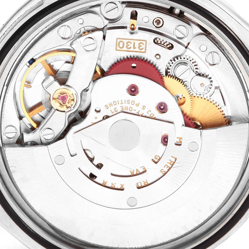 The image shows an up-close shot of the movement mechanism of a Rolex Explorer 114270 Men's Stainless Steel Black Dial 114270 Men's Stainless Steel Black Dial watch.